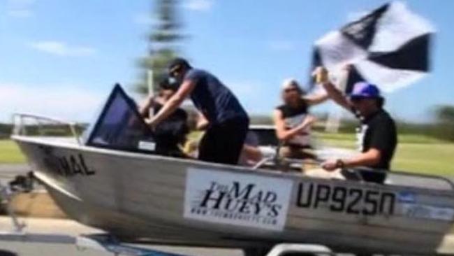 The boys with the boat.