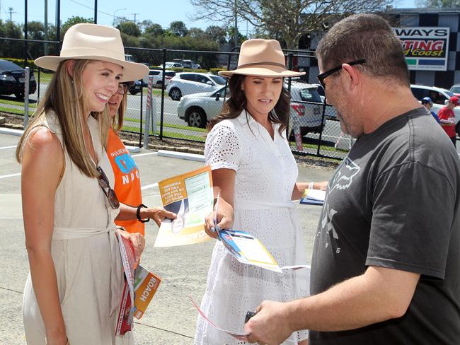 Labor’s Meaghan Scanlon and the LNP’s Bianca Stone at a polling centre in Nerang on Friday. Picture: Richard Gosling.