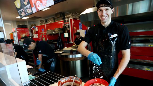 Franchise Trainer Stewart Lyne making pizza at Domino's at Hamilton. Picture: Tara Croser.