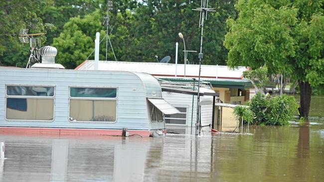 RIVER LEVELS: The flooded Finemore Caravan Park in Bundaberg. Photo: Max Fleet / NewsMail. Picture: Max Fleet BUN280113FNM13