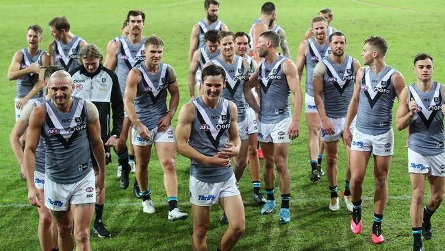 Power players were all smiles after retaining top spot on the AFL ladder. Picture: Jono Searle (Getty).