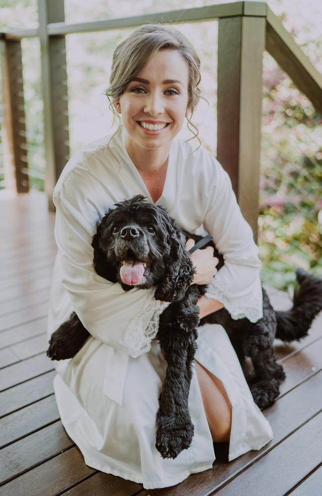 The bride Katherine Ash with cavoodle Oscar.