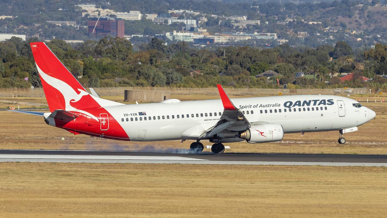 Qantas flight turns back over ‘unusual smell’