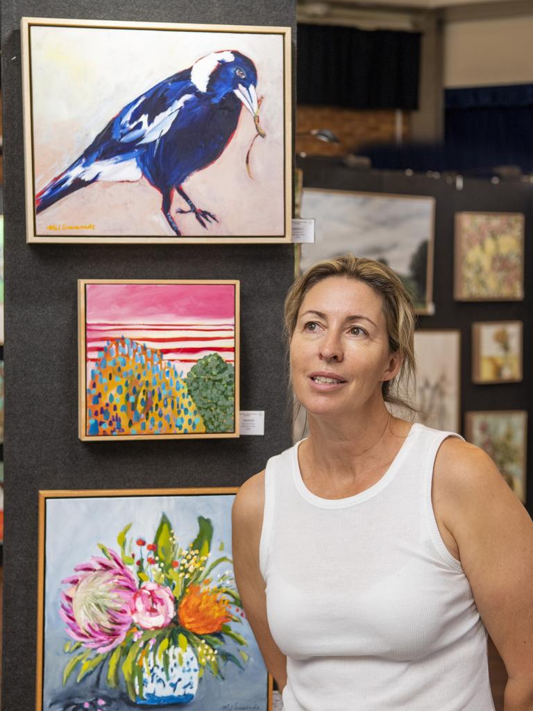 Grammar Art Show president Rebecca Statton with three of the works featured at this year’s art show. Picture: Nev Madsen.