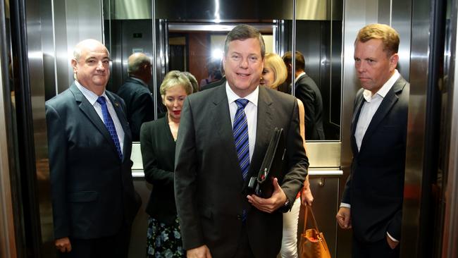 Tim Nicholls MP walking with supporters towards the Partyroom leadership spill, Parliament House Annexe, Brisbane. (L-R) Michael Hart, Ros Bates, Tracey Davis and Scott Emerson Photographer: Liam Kidston