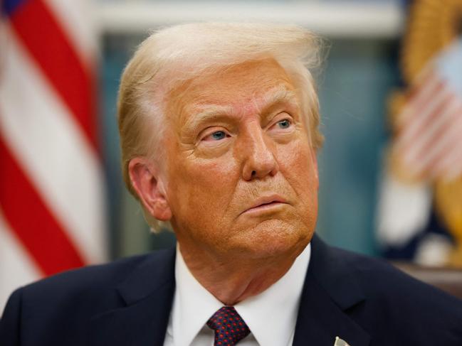 WASHINGTON, DC - JANUARY 20: President Donald Trump signs executive orders in the Oval Office on January 20, 2025 in Washington, DC. Trump takes office for his second term as the 47th president of the United States.   Anna Moneymaker/Getty Images/AFP (Photo by Anna Moneymaker / GETTY IMAGES NORTH AMERICA / Getty Images via AFP)