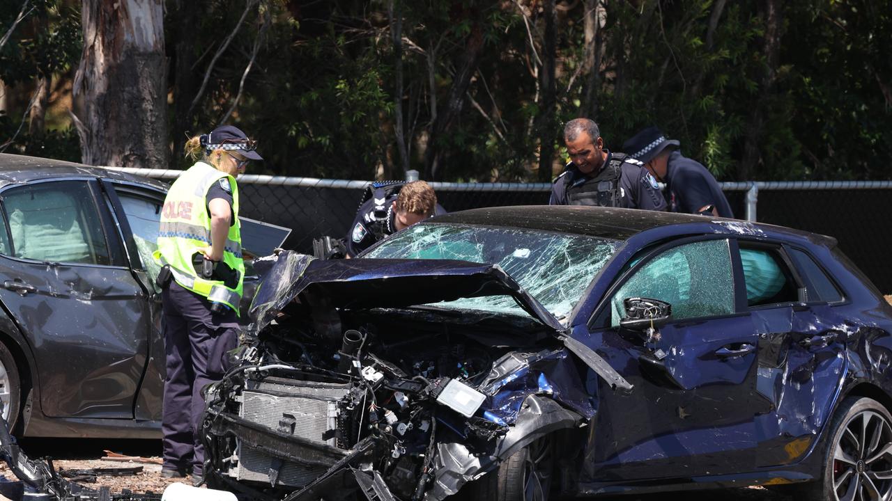 Police at the scene of the fatal crash at the intersection of Castle Hill Drive and Dohles Rocks Road on Thursday. Picture Lachie Millard