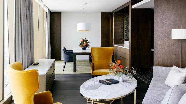 The Ritz-Carlton Executive Suite furnished with richly textured velvet armchairs. Picture: Elise Hassey