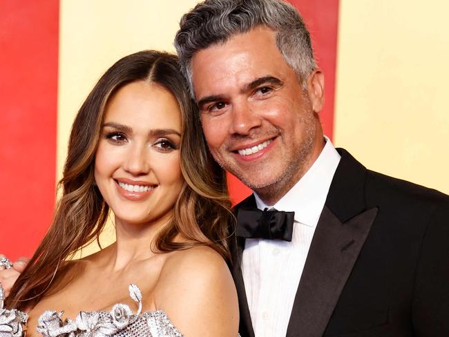 Actress Jessica Alba and husband, film producer Cash Warren, attend the Vanity Fair Oscars Party at the Wallis Annenberg Center for the Performing Arts in Beverly Hills, California, on March 10, 2024. (Photo by Michael TRAN / AFP)