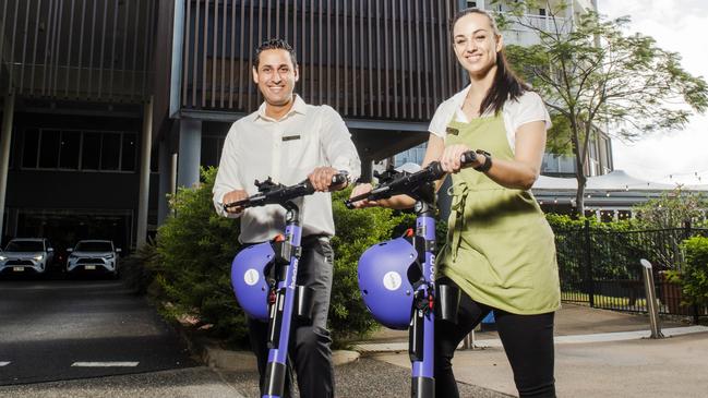 Karn Kapur and Kristina Sinnott riding around on the new e-scooters in Cairns. Picture: Supplied