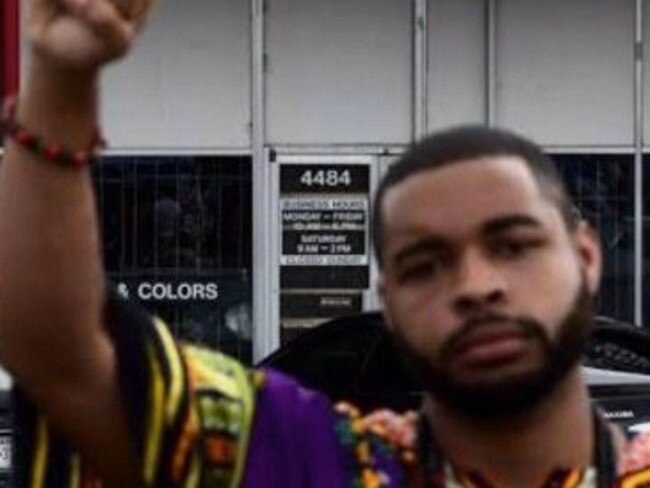 Micah Johnson left the initials ‘RB’ written in his own blood, police say.