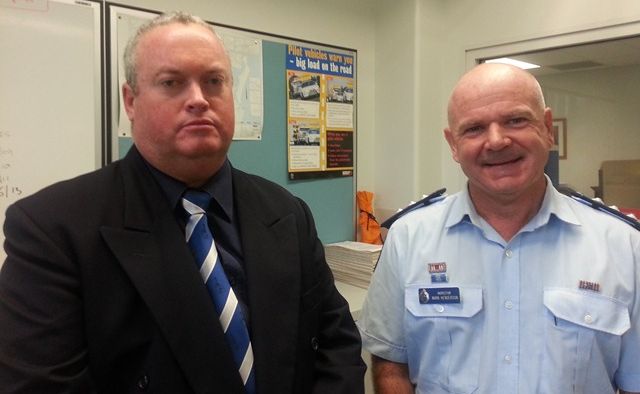 Detective Senior Sergeant Joe Hildred and Acting Superintendent Mark Henderson at a press conference in Bundaberg today.