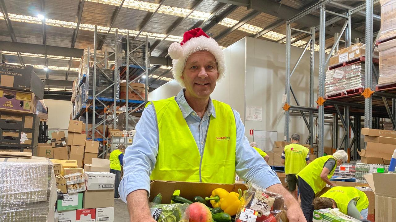 SecondBite CEO Steve Clifford helping dispatch Christmas hampers. Picture: Supplied