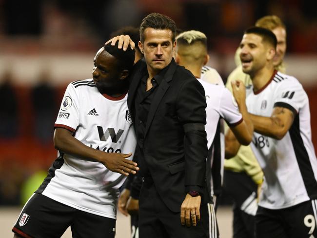 NOTTINGHAM, ENGLAND - SEPTEMBER 16: Neeskens Kebano of Fulham (L) and Marco Silva, Manager of Fulham celebrate following their side's victory in the Premier League match between Nottingham Forest and Fulham FC at City Ground on September 16, 2022 in Nottingham, England. (Photo by Gareth Copley/Getty Images)