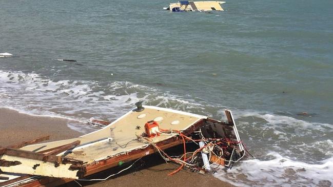 Parts of a trimaran washed up on the Airlie Beach foreshore on the weekend. Picture: VMR Whitsunday