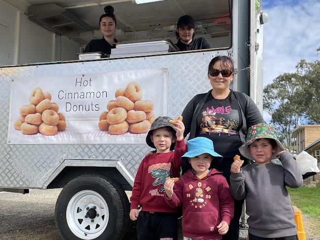 Jade Young and Sebashian McLean serving up donuts to Lisa Colemna, Dougie O’Brian, Nate Rolley and Joseph Cranitch.