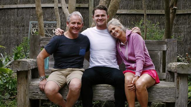 Parents John and Janette say their son is happy to be back home. Picture:Wayne Ludbey