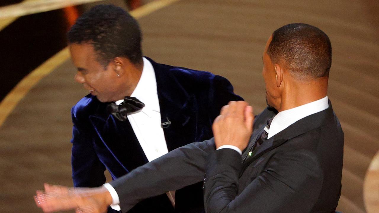 Smith slaps Rock live onstage at the Oscars. Picture: REUTERS/Brian Snyder