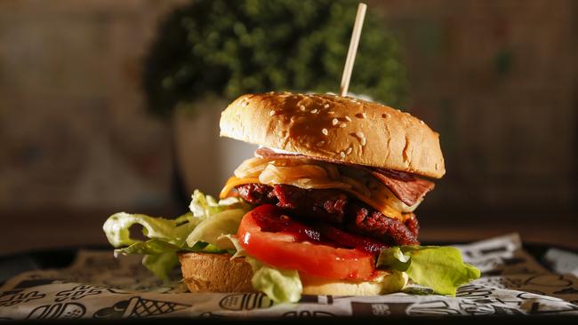 A fake meat burger. Eating cultured meats would be a “betrayal” to the national identity of many Gen Z Aussies, according to research. Picture: Valeriu Campan