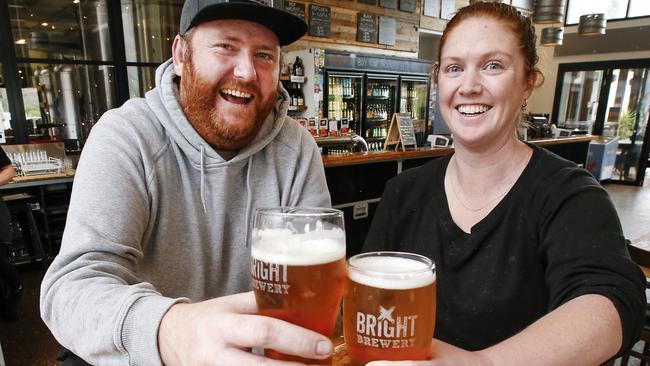 Bright locals Bryan Farrell and Kristi Hacket finally get to have a beer in the bar at the Bright Brewery. Picture: David Caird