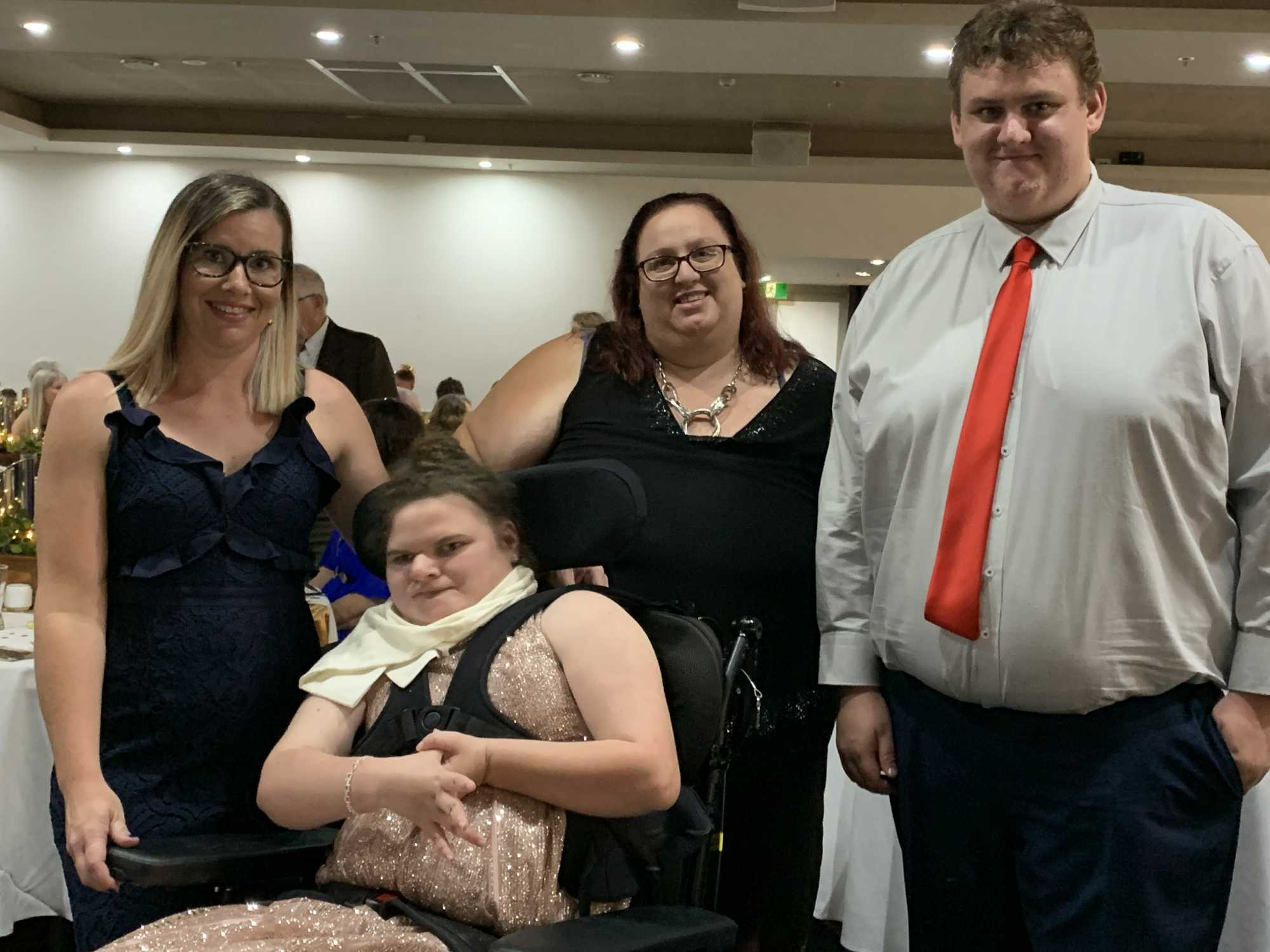 Graduating students from Hervey Bay Special School celebrate their formal.