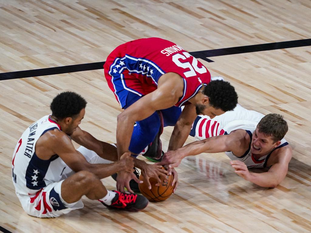 The Wizards did not make it easy on Ben Simmons. (Photo by Ashley Landis-Pool/Getty Images)