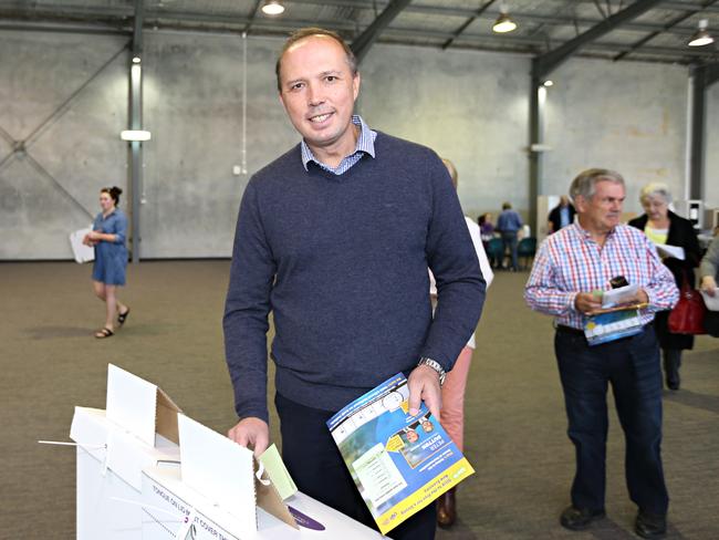 Peter Dutton, pictured here voting in 2016, probably needs to do some more work in his local electorate. He only holds his seat by 3000 votes. Picture: Annette Dew