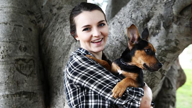 Headspace Ambassador Rachael Laidler with her 10-week-old puppy Keira. Picture: Tim Hunter