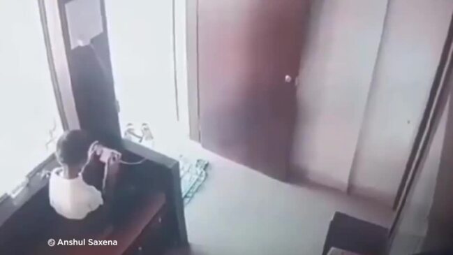 Chilling moment 12yo boy locks wild leopard in room