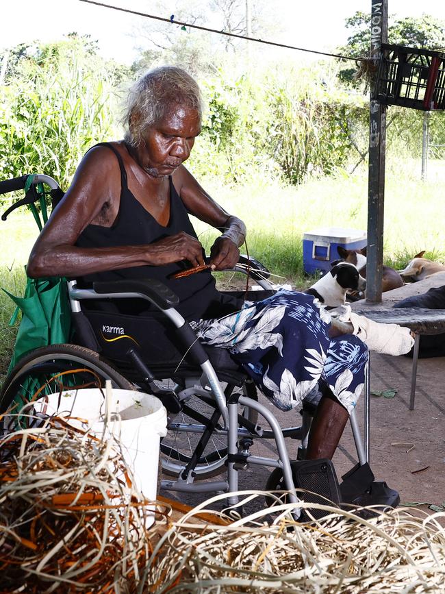 69 year old Aunty Maureen Karyuka weaves pandanus leaves into patterns on the front porch in Aurukun, a small Indigenous town on the Gulf of Carpentaria, 800 kilometres north northwest of Cairns on Cape York in Far North Queensland. Picture: Brendan Radke