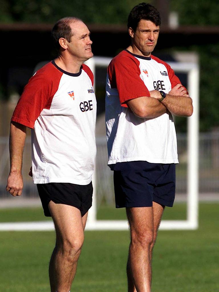 Rodney Eade and then assistant Roos at Swans training.