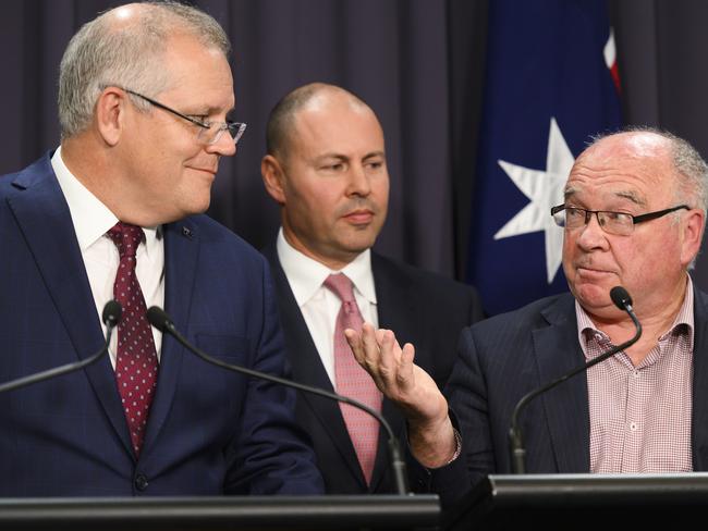 Council of Small Business Australia CEO Peter Strong (R) speaks alongside Scott Morrison as Josh Frydenberg looks on. Picture; Getty Images.