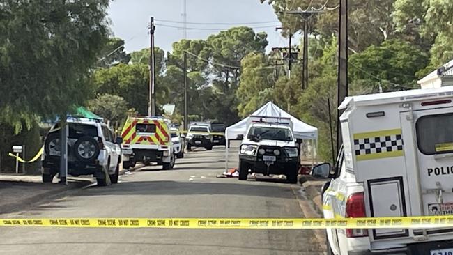 Police on the scene at Symons Street, Crystal Brook, after a man was shot dead and two officers stabbed. Picture: Isaac Selby