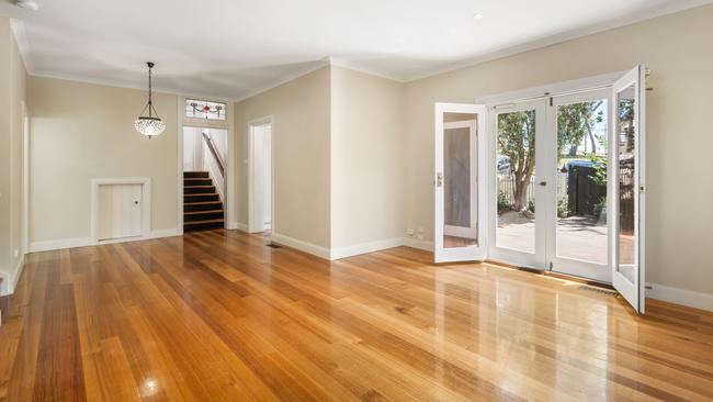 The main living room flows out to an outdoor entertainment area.