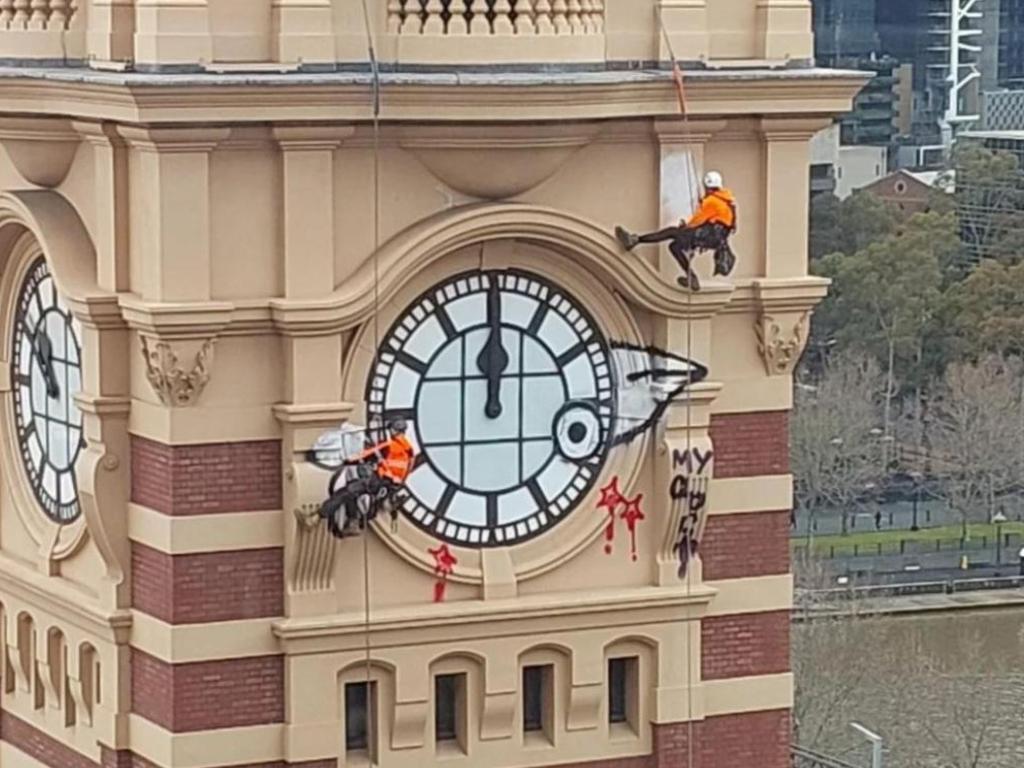 Earlier this year the tag was sprayed on the Flinders Street Station clock tower. Picture: Reddit