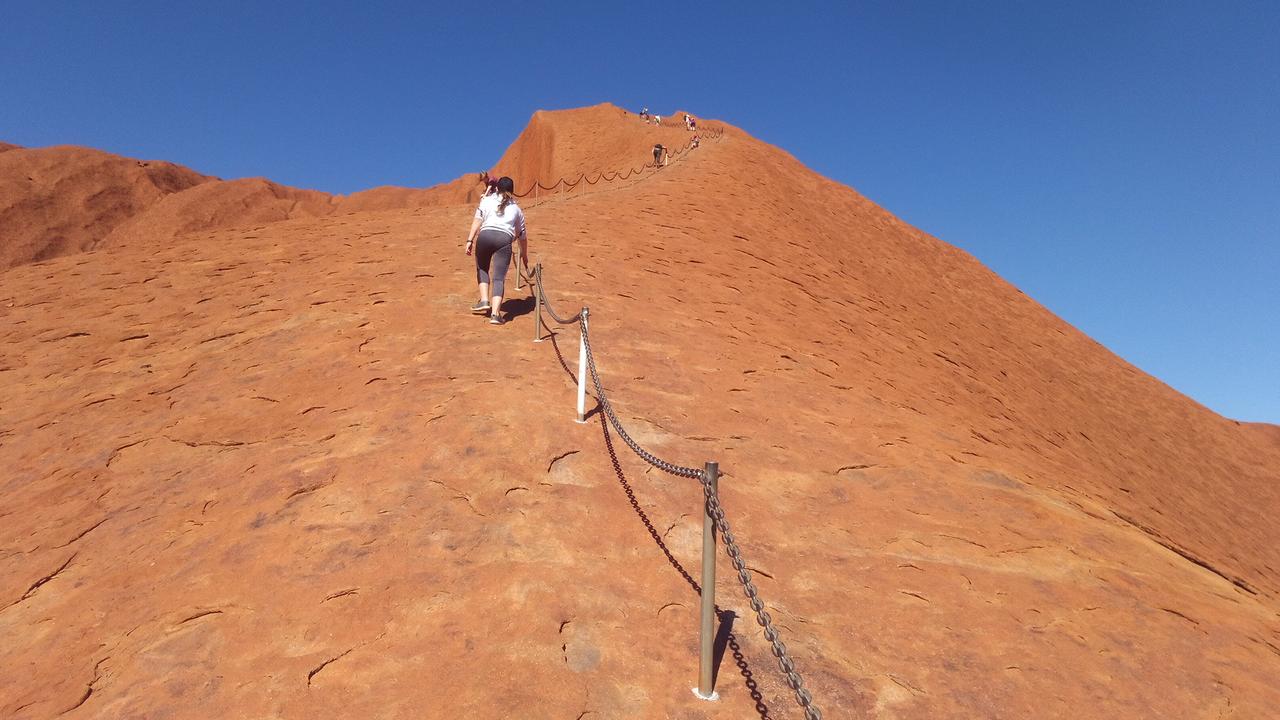 Many Australians have chosen to climb to the top of Uluru. Picture: Marc Hendrickx