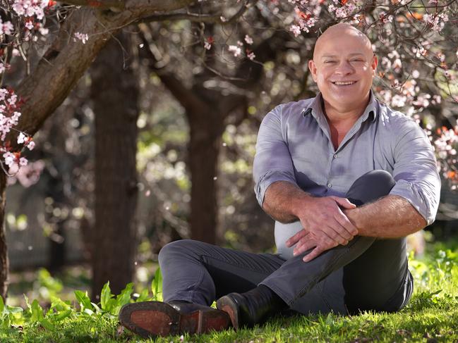 At Penfold Park, Darren Ray (meteorologist) among the springtime cherry blossoms for his weather predictions for this spring. 27 August 2024. Picture: Dean Martin