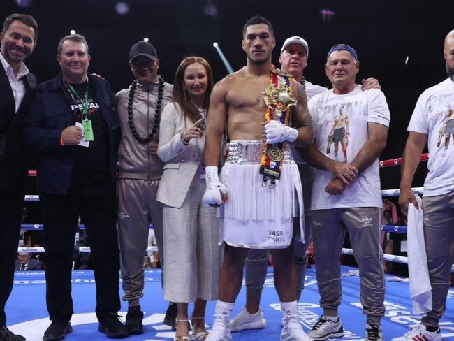 Boxing promoters Eddie Hearn (far left) and Mick Francis (second left) with cruiserweight world champion Jai Opetaia (centre). Picture: Supplied