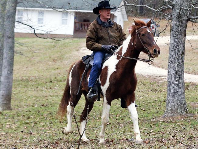 US senate candidate Roy Moore rides a horse to vote during the Alabama election on Tuesday. Picture: AP Photo/Brynn Anderson