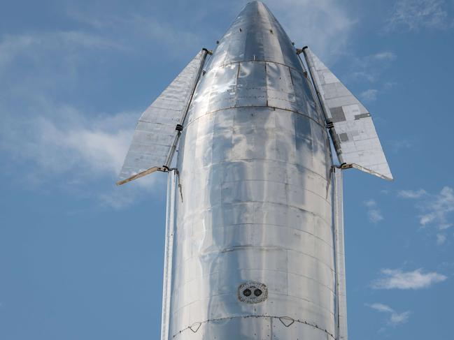 BOCA CHICA, TX - SEPTEMBER 28: A prototype of SpaceX's Starship spacecraft is seen at the company's Texas launch facility on September 28, 2019 in Boca Chica near Brownsville, Texas. The Starship spacecraft is a massive vehicle meant to take people to the Moon, Mars, and beyond.   Loren Elliott/Getty Images/AFP == FOR NEWSPAPERS, INTERNET, TELCOS & TELEVISION USE ONLY ==