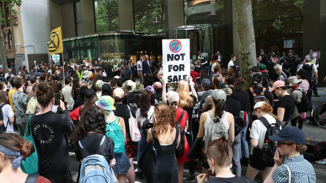 Protesters march to the Rion Tinto offices. Picture: AAP