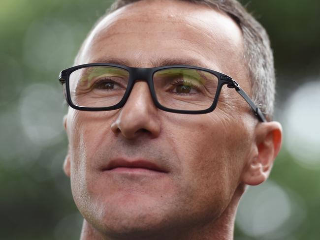 Greens Leader Richard di Natale listens to a question during a visit to the seat of Grayndler in Sydney on Monday, May 9, 2016. (AAP Image/Paul Miller) NO ARCHIVING