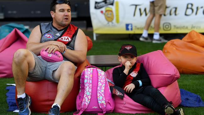 Esendon fans make the most of the bean bags behind the goals.