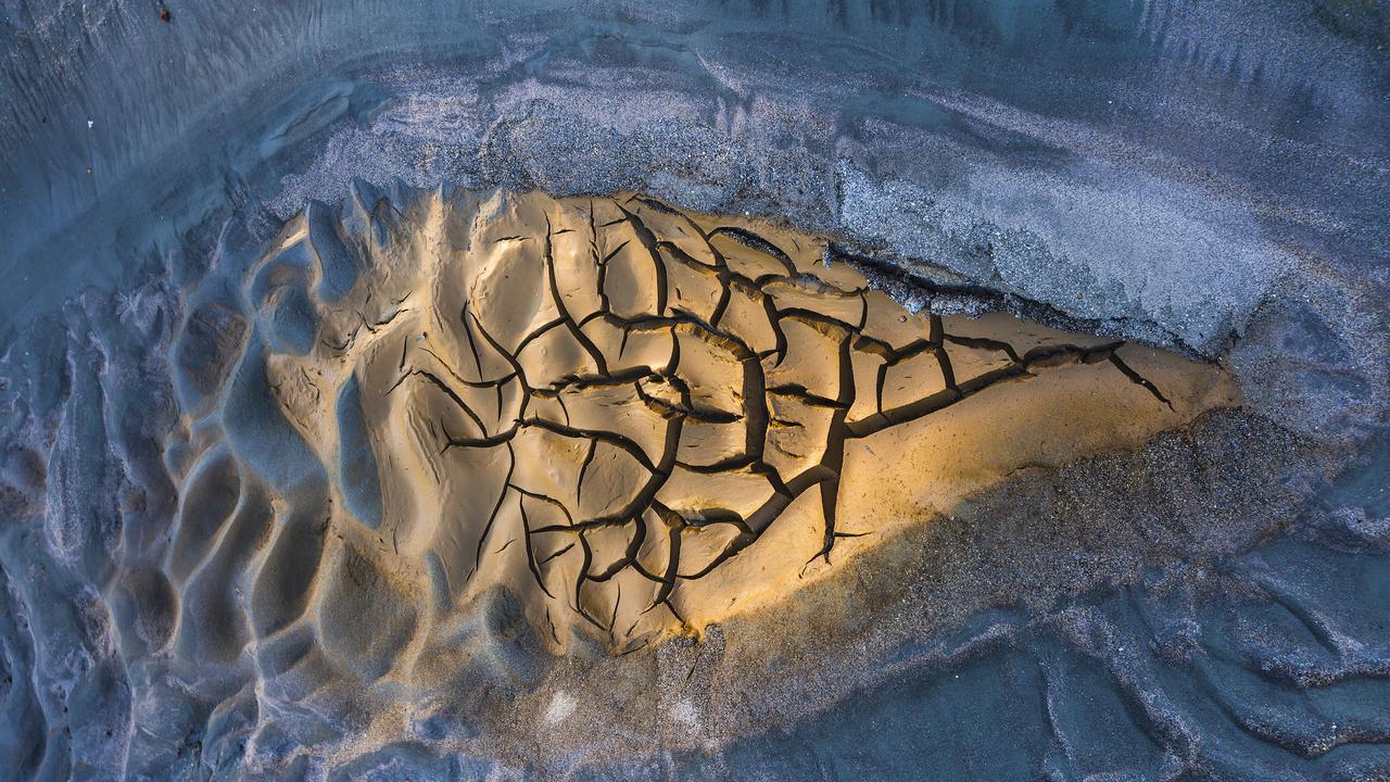 A break in the snow at Rio Tinto, Spain, winner of the Art of Nature category. Picture: Juan Jesús González Ahumada