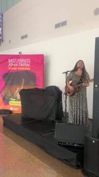 Australian Idol contestant Prayer Corby performs at Darwin International Airport.