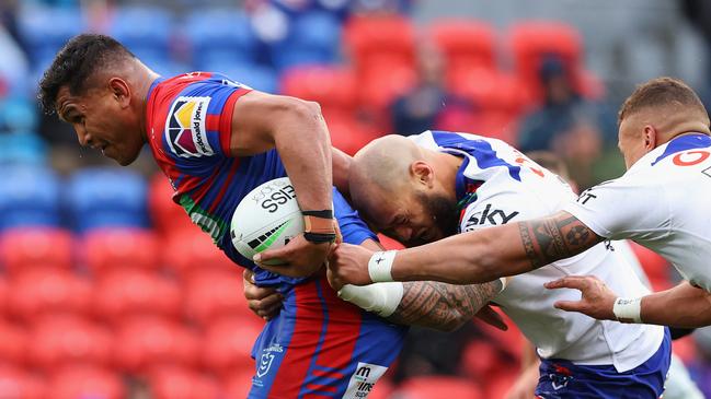 Daniel Saifiti bursts through the Warriors defence. Picture: Ashley Feder/Getty Images