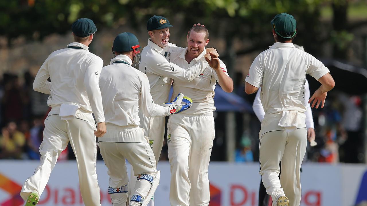 Australia's Jon Holland celebrates a wicket in Sri Lanka in 2016. Picture: AP Photo/Eranga Jayawardena)
