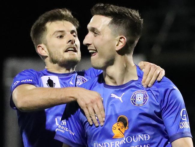 MELBOURNE, AUSTRALIA - JULY 25:  Liam Boland of Avondale FC celebrates with Kaine Sheppard after scoring their third goal during the FFA Cup round of 32 match between Avondale FC and Marconi Stallions FC at ABD Stadium on July 25, 2018 in Melbourne, Australia.  (Photo by Scott Barbour/Getty Images)