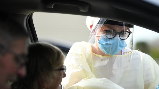 People are tested at a COVID-19 drive through testing clinic at Chifley Sports Reserve in Sydney. Picture: NCA NewsWire/Joel Carrett