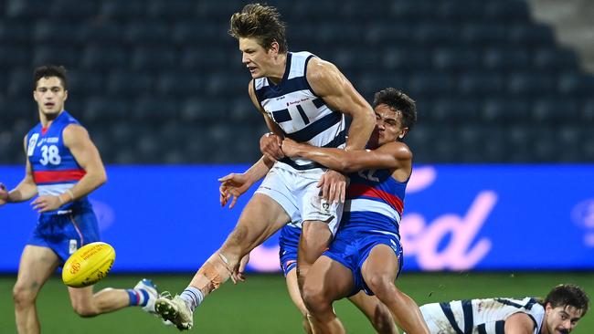 Ugle-Hagan tackles Geelong’s Rhys Stanley in the VFL. Picture: Quinn Rooney/Getty Images